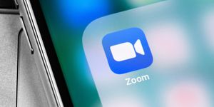 zoom icon displayed on smartphone screen